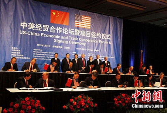 中美经贸合作不断加深,外媒认为中国市场的巨大潜能美国无法忽视。(资料图) 外媒:美国企业是否来中国不由奥巴马说了算(图)